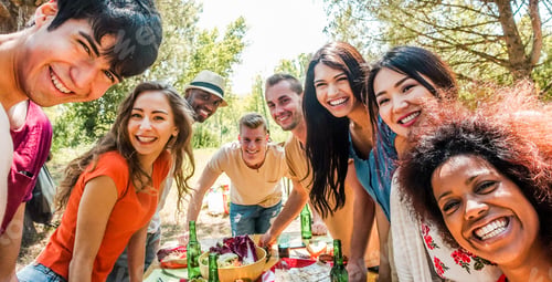 Preview: Happy Friends Eating And Drinking Beers At Barbecue Dinner At Sunset - Group Of People Having Meal