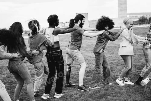 Preview: Young Diverse People Having Fun Outdoor Dancing Together - Focus On Leg Prosthesis - Black And