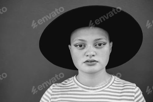 Preview: Hipster Bald Girl Looking Serious At Camera Outdoor - Focus On Face - Black And White Editing
