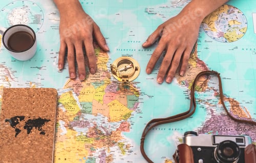 Preview: View From Above Of Young Woman Planning Her Vacation Using World Map - Travel Influencer Looking