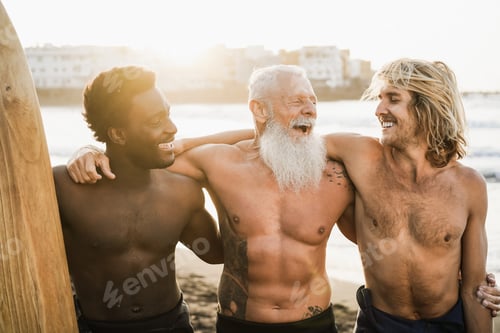 Preview: Multi Generational Surfer Friends Having Fun On The Beach After Surf Session - Main Focus On Senior