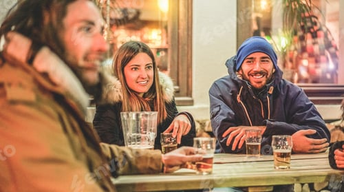 Preview: Happy Friends Toasting Beers At Chalet Pub Restaurant In Mountains On Evening Time - Rich People