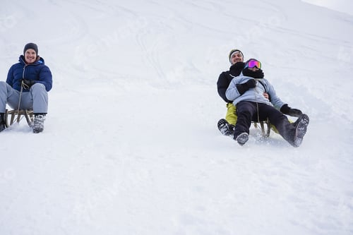 Preview: Crazy Happy Friends Having Fun With Sledding On Snow High Mountains