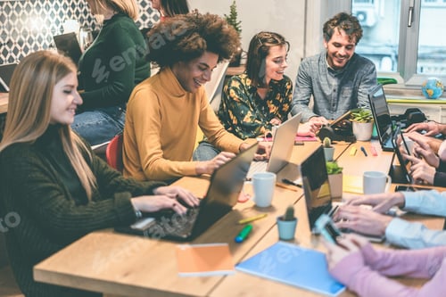 Preview: Young Multiracial People Working Inside Coworking Office - Soft Focus On Right Girl Face
