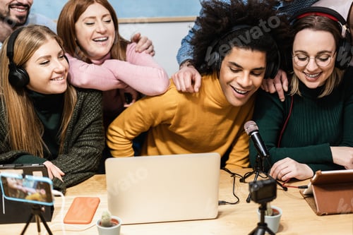 Preview: Happy Diverse Friends Having Fun Streaming Online Using Computer Laptop And Smartphone App - Main