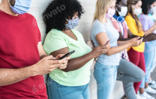 Preview: Young People Wearing Face Safety Masks Using Smart Mobile Phones While Keeping Social Distance