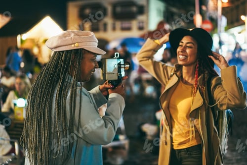 Preview: African Mother And Daughter Having Fun Using Vintage Old Video Camera Outdoor - Soft Focus On