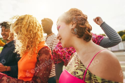 Preview: Happy Young People Dancing Outdoor At Festival Event - Soft Focus On Right Girl Ear