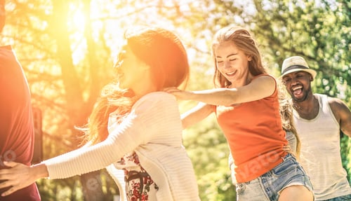 Preview: Happy Young Friends Running And Dancing Into The Wood Party On Summer Time - Diverse Culture People