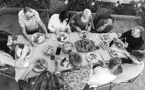 Preview: Multiracial Family People Eating At Barbecue Dinner At Patio Terrace - Soft Focus On Asian Woman