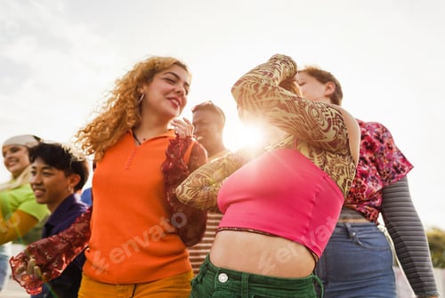 Preview: Happy Young People Dancing Outdoor At Festival Event - Soft Focus On Right Girl Pants