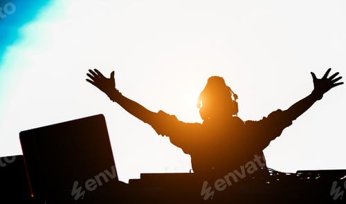 Preview: Silhouette Of Dj Mixing Outdoor With Back Sun Light - Portrait Of Disc Jockey Playing Trendy Music