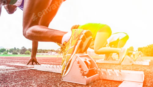 Preview: Runners Feet On Starting Blocks In A Athletic Running Track - Young Multi Race People Training