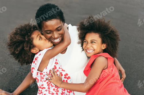 Preview: African Sisters Having Fun With Their Mother On The Beach - Focus On Right Girl Hand - Mom Day And