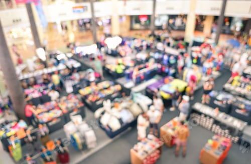 Preview: Blurred People In The Shopping Mall - Concept Of Consumerism During Sales Time - Defocused Image Of