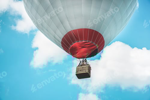 Preview: Happy Young Couple Flying On Balloon Airship - Lovers Having Fun In Adventure Vacation Trip