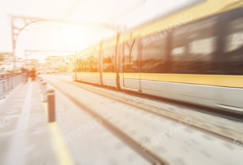 Preview: Blurred Motion Of Metro Train Speeding On City Urban Line At Sunset - Defocused Image - Blurry