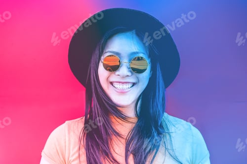 Preview: Portrait Of Happy Asian Girl Smiling With Vintage Sunglasses - Radial Purple And Blue Filter