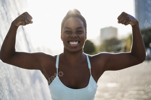 Preview: Happy African Woman Doing Workout Routine Outdoor In The City - Focus On Face