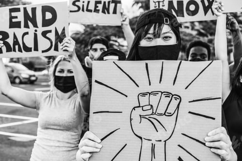 Preview: Asian American Protestor Girl Doing Demonstration Against Racism During Coronavirus Outbreak
