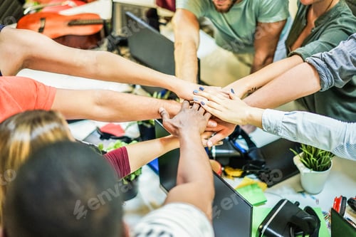 Preview: Young Team Stacking Hands Together For New Startup Project - Diverse Culture People Giving Strength