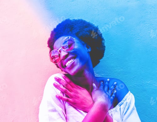 Preview: Woman Posing with Colorful Lighting and Round Sunglasses