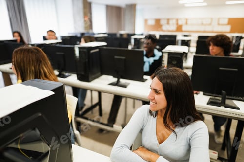 Preview: Young Students Using Computers Inside Technology Class At School Room - Focus On Right Girl Eye