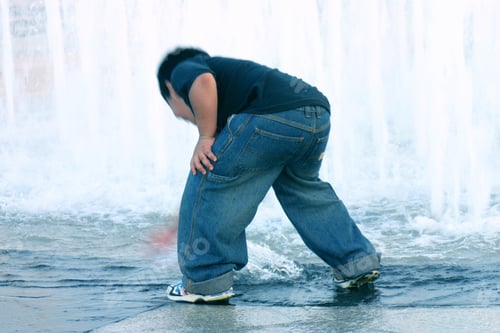 Preview: Kid Playing In Water Fountain