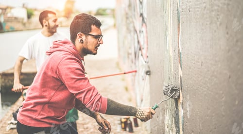 Preview: Two Writers Covering The Wall With Grey Color Before Painting Their Picture - Contemporary Artists