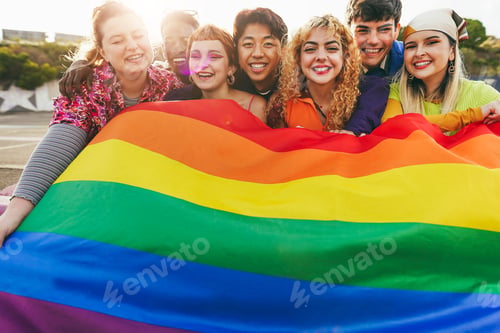Preview: Young Diverse People Having Fun Holding Lgbt Rainbow Flag Outdoor - Focus On Center Blond Girl