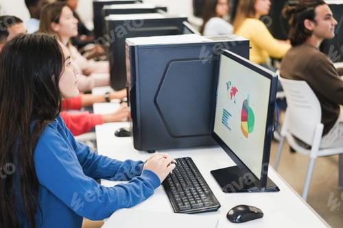 Preview: Young Students Using Computers During Business Class At School - Focus On Girl Hands