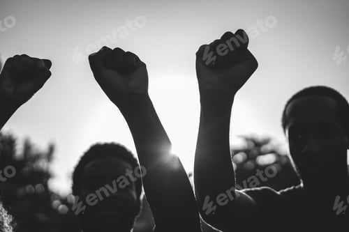 Preview: Black Demonstrator People Holding Hands Against Racism - Focus On Center Fist - Black And White Edit