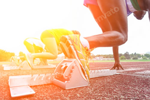 Preview: Runners Feet On Starting Blocks In A Athletic Running Track - Young Multi Race People Training