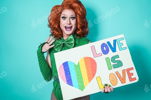 Preview: Happy Drag Queen Holding Gay Pride Banner - Lgbtq And Concept - Focus On Face