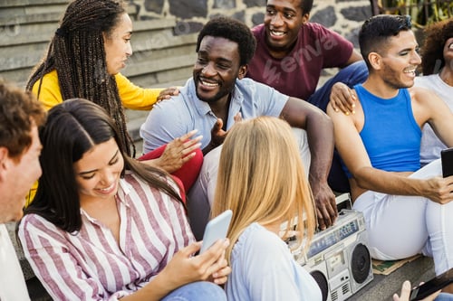 Preview: Young Diverse People Having Fun Listening Music With Boombox Stereo Outdoor - Focus On African Girl