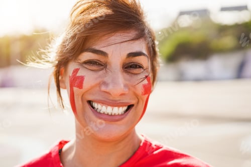 Preview: Red Mature Sport Fan Laughing Out Of The Stadium Before Football Match - Focus On Left Eye