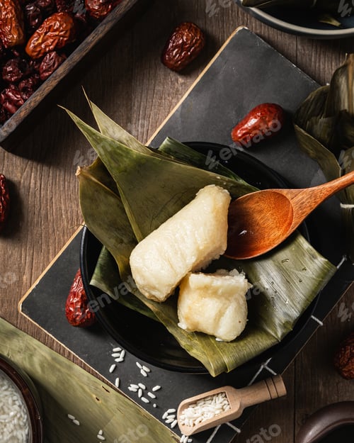 Preview: A Closeup Shot Of Preparation Of Rice Dumpling With Banana Leaves