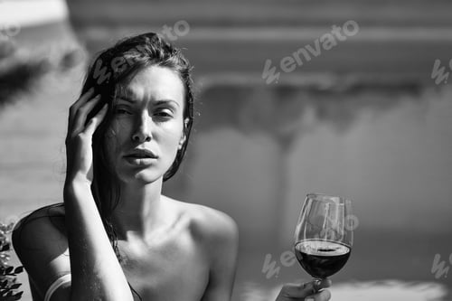 Preview: Young Sexy Woman Or Girl With Pretty Face And Long Wet Brunette Hair Drinking Red Wine From Glass