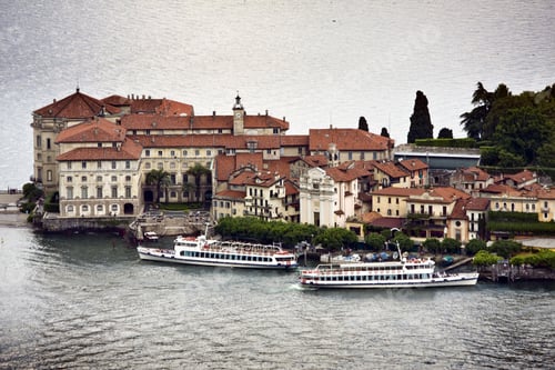 Preview: A View Of Classical Buildings On A Port With Boats Floating In The Sea
