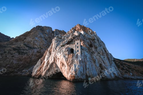 Preview: A Beautiful Shot Of A Sea With Cliffs In The Background