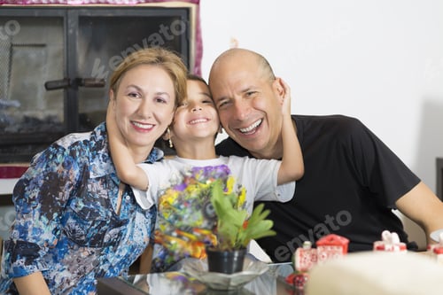 Preview: Happy Family Smiles Together at Home Indoors
