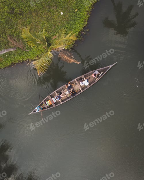 Preview: A Top View Shot Of People Canoeing In Munroe Island