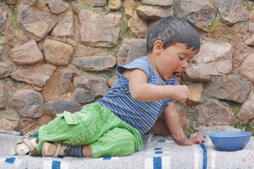 Preview: Little Latin Boy Eating Outside. Rural Background.