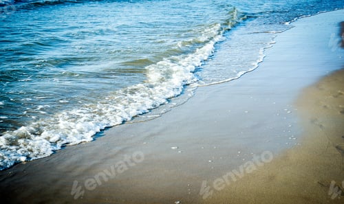Preview: A High-Angle Shot Of Sea Waves Rushing To Shore
