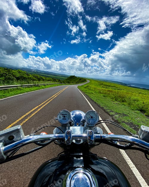 Preview: A Vertical Shot Of A Motorbike On The Road With The Beautiful View Of Mountains On Kauai, Hawaii