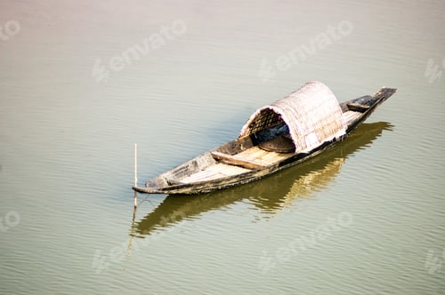 Preview: A High Angle Shot Of An Old Boat In The Lake At Daytime