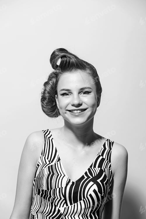 Preview: Girl In Stylish Vintage Dress On Pink Background. Woman With Retro Hair And Fashionable Makeup