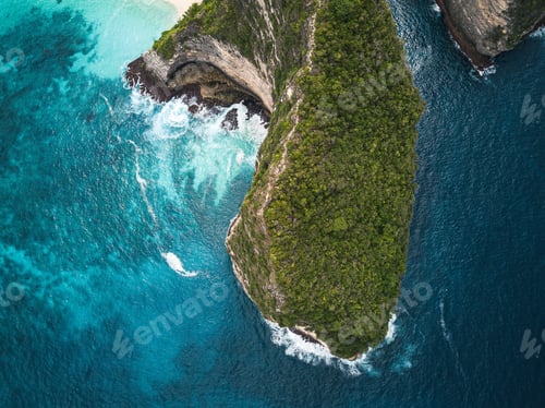Preview: An Aerial Shot Of The Cliffs Covered In Greenery Surrounded By The Sea Under The Sunlight - Perfect
