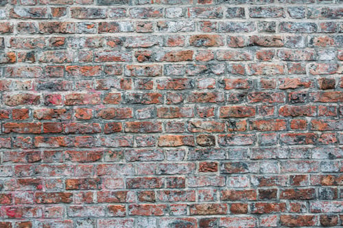 Preview: Weathered Brick Wall Background with Red and Grey Bricks