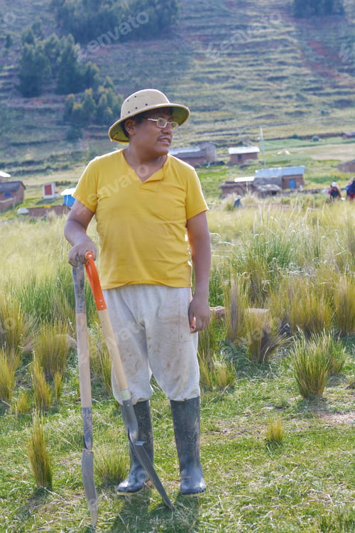 Preview: Native American Farmer Holding Tools In The Countryside.
